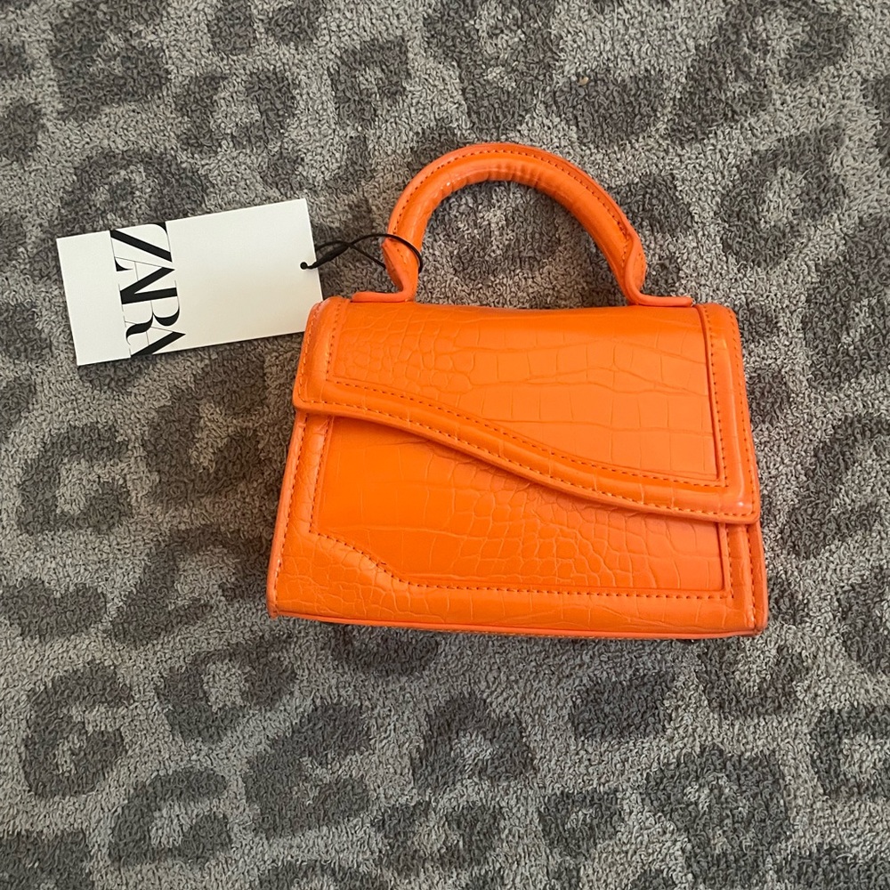 Mini Purse with asymmetrical flap and top handle